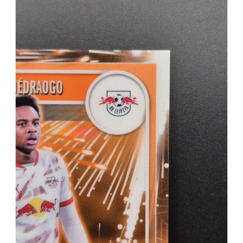 2025 Topps Merlin Collection Assan Ouedraogo #MG-37 Super Rare Orange /25 (RC)